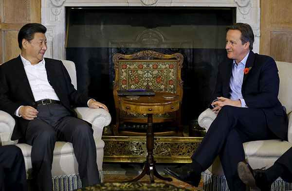 Xi Jinping et David Cameron devant un fish and chips