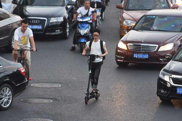 Les scooters interdits sur les routes de Beijing et Shanghai