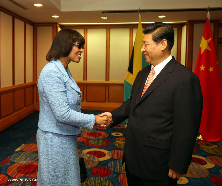 Le président chinois Xi Jinping rencontre avec le Premier ministre de Jama?que Portia Simpson-Millier.