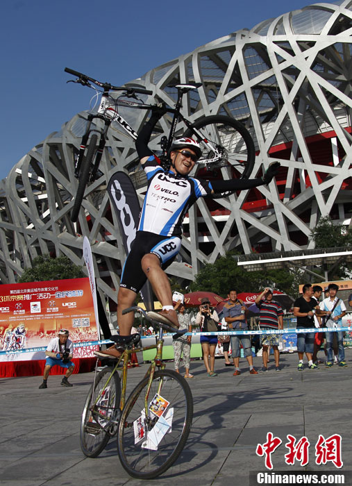 Beijing fête le 5e anniversaire des JO sur deux roues (3)