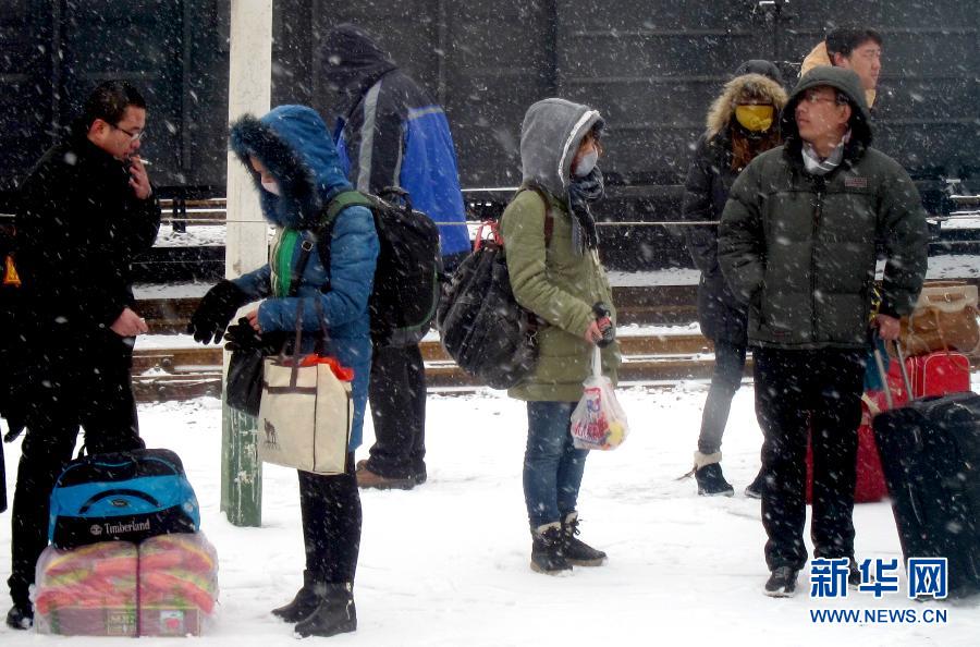 Des tempêtes de neige perturbent le retour des vacanciers chinois (6)