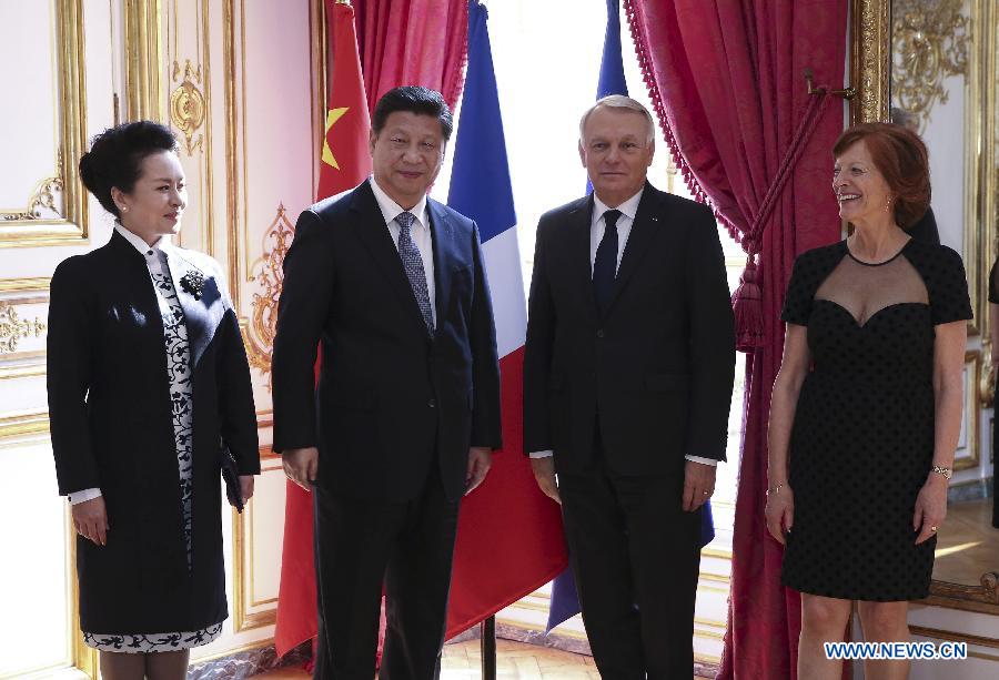 Le président chinois Xi Jinping rencontre le Premier ministre fran?ais Jean-Marc Ayrault, à Paris le 27 mars 2014 et indique que la Chine et la France jouissent d'énomes potentiels pour promouvoir la coopération bilatérale.